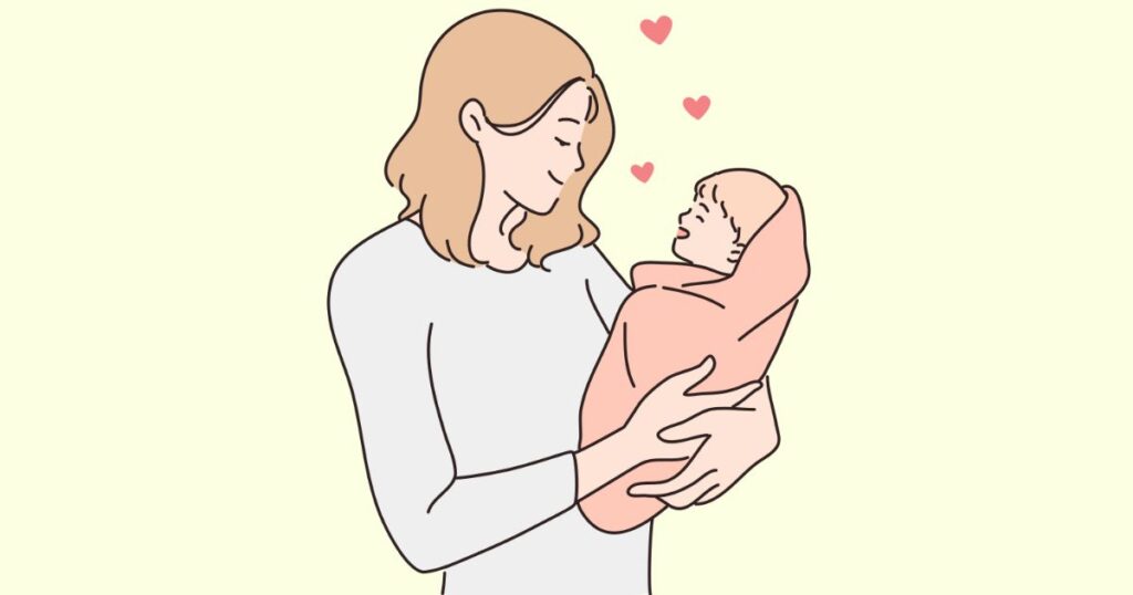 お母さんが赤ちゃんを抱っこしている画像